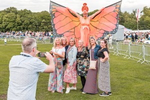 Guests with Stilt Walkers at Classic Ibiza Tatton 2023