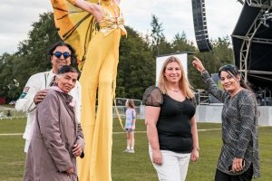 Guests with Stilt Walkers at Classic Ibiza Tatton 2023