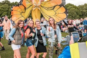 Guests with Stilt Walkers at Classic Ibiza Tatton 2023